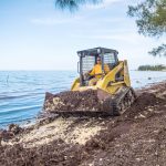 NiCE crew provides sargassum relief on Grand Cayman beaches