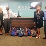 Rotary Sunrise donates backpacks