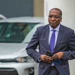 Equipment salesman interrogated in football fraud trial