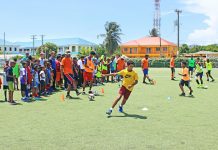 180 young players attend football camp