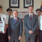 Governor pinned with first poppy