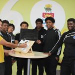 Students build desks for visually impaired children
