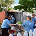 Cruise tourists volunteer at three local charities