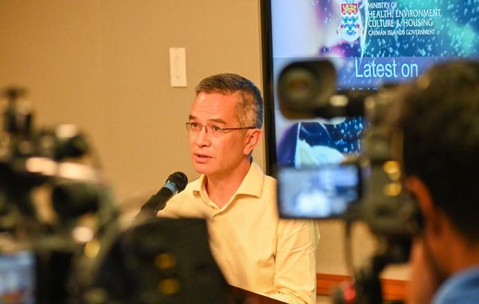 Dr. John Lee, Cayman's chief medical officer at a recent press briefing
