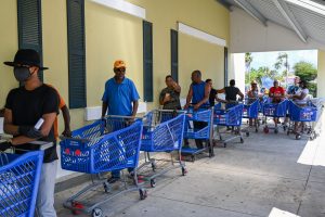 :Long lines at supermarkets and banks have prompted a new alphabetical system for dealing with customers to be put in place.