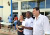 Doctors Hospital donates meals to food bank Dr. Sophia Rado, Chef Wayne Spencer from The Kitchen Table, and Dr. Yaron Rado outside of Chrissie Tomlinson Memorial Hospital