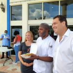 Doctors Hospital donates meals to food bank Dr. Sophia Rado, Chef Wayne Spencer from The Kitchen Table, and Dr. Yaron Rado outside of Chrissie Tomlinson Memorial Hospital