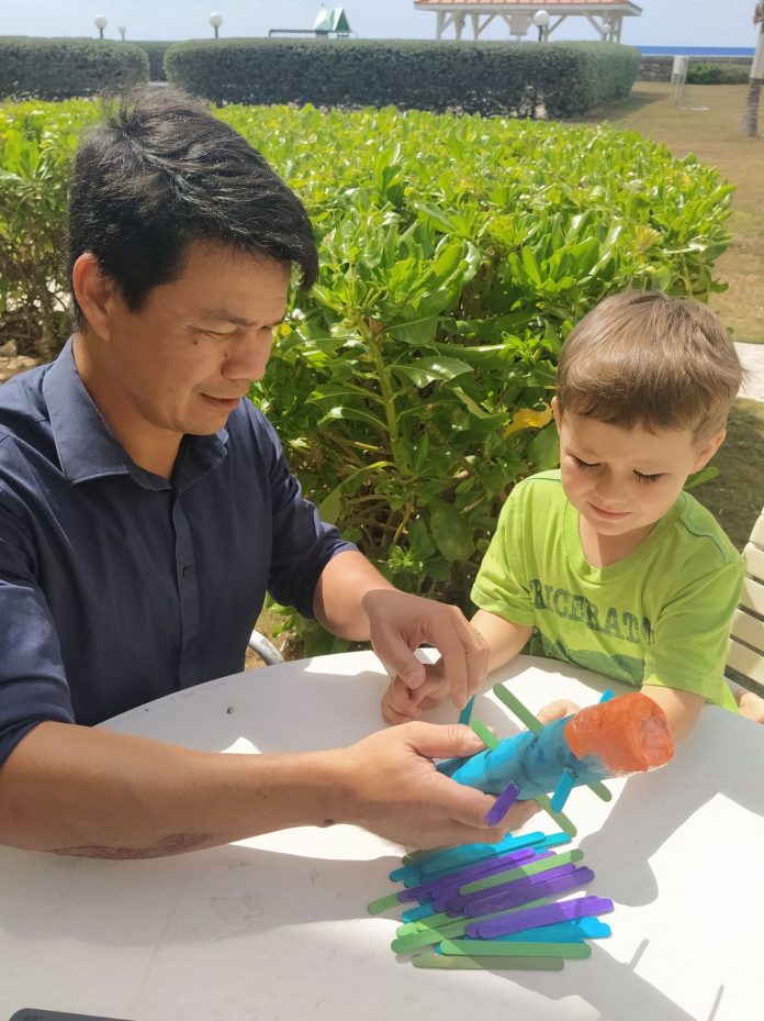 Tiyen Miller has sought out interactive learning opportunities for his son during the shutdown.