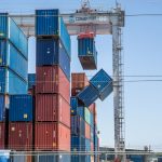 Containers topple over at cargo storage facility