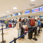 Cayman’s air travel ban begins Passenger check in for the final flights out of Cayman on Sunday