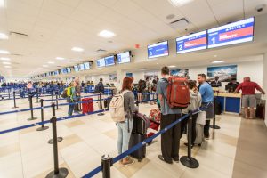 Passenger check in for the final flights out of Cayman on Sunday