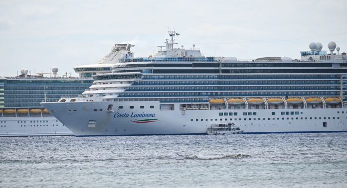 Tender boats transfer passengers from the Costa Luminosa on 29 Feb. in Spotts, Grand Cayman.