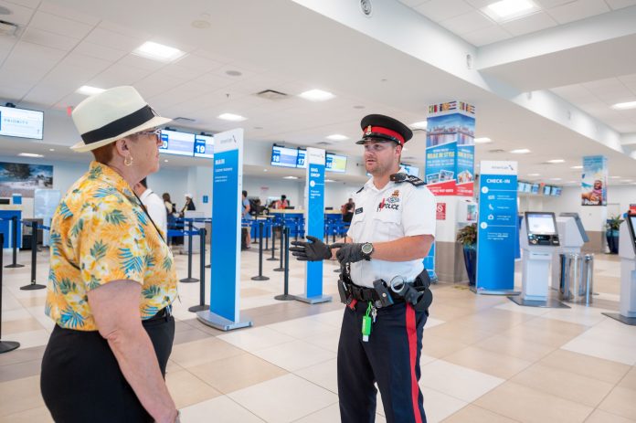 An officer on high-visibility patrol at the airport