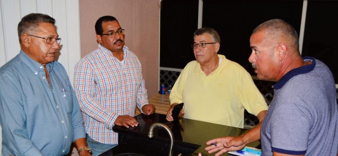 Residents and business-owners gathered for the meeting at the home of McKeeva Bush in West Bay.