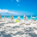 Halt to tourism weighed on Cayman economy, despite strong construction and finance sectors Empty deckchairs outside the Westin Hotel, Sunday. The tourism industry is facing massive cancellations.