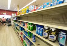 Shoppers panic buy as government urges calm Limits are being imposed on most items at Cayman's major stores in an effort to prevent panic buying.