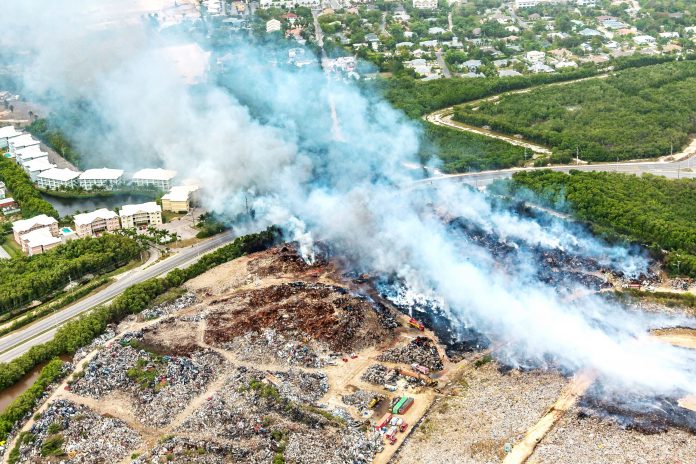 Smoke wafts across the Esterley Tibbetts Highway towards Lakeside Apartments during this week's landfill fire