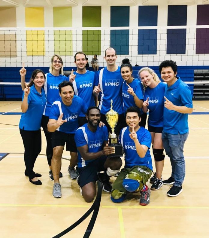 KPMG wins the corporate league trophy after beating MUFG in straight sets.