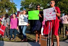 Protesters show ‘she is supported’
