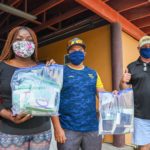 Cayman community answers call for protective masks Anesa Miller Goodall and Jhon Mora, of Kitesurf Cayman have repurposed their sewing machines, typically used for kitesurfing repairs, to make free face masks for the community