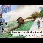 Residents hit the beaches under relaxed rules