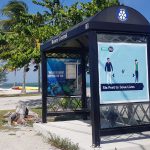 COVID safety messages appear on bus stops
