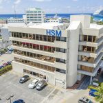 HSM to buy Higgs & Johnson’s Cayman business