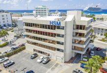 HSM to buy Higgs & Johnson’s Cayman business