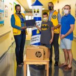 Local IT company organises laptop donations to students