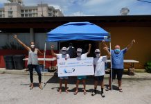 Kite for COVID trio presents cheque to ARK