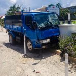 Truck collides with police vehicle