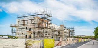 Cayman’s construction engine kicks into high gear