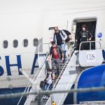 Home isolating passengers under 24/7 surveillance