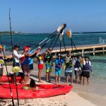 Kayakers paddle ‘Round the Rock’