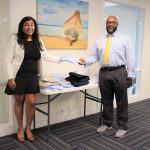 Business Women’s Association donates 100 school uniforms Mahreen Nabi (l) photographed making a donation to the department for education - Photo: Submitted
