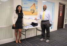Business Women’s Association donates 100 school uniforms Mahreen Nabi (l) photographed making a donation to the department for education - Photo: Submitted