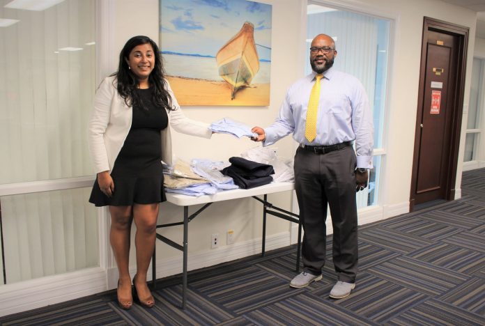 Mahreen Nabi (l) photographed making a donation to the department for education - Photo: Submitted