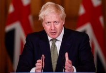 Johnson locks down England as UK COVID-19 cases pass 1 million