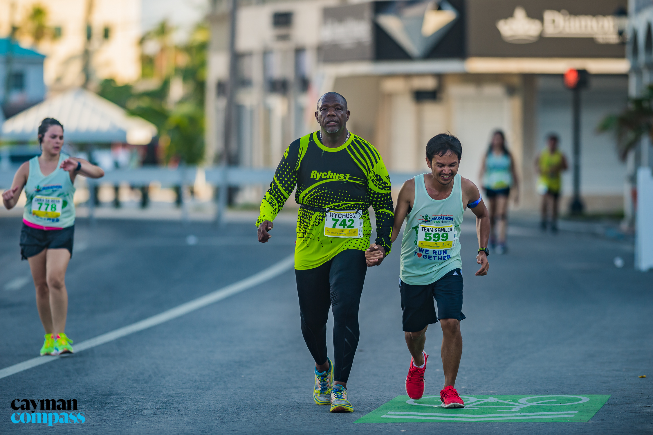 Hundreds turn out for marathon day Cayman Compass