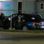 One dead after car crashes into house in West Bay