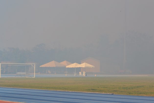 Truman Bodden sports complex and the University College of the Cayman Islands were evacuated due to a large brushfire in the Windsor Park area.&nbsp;-Photo: Seaford Russell Jr.
