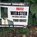 Candidate Kenrick Webster’s election poster defaced