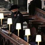 Queen Elizabeth stands alone as Philip is laid to rest Queen Elizabeth