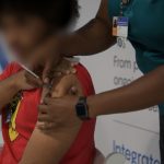 61% of Cayman’s eligible population vaccinated Cayman Islands vaccination clinic
