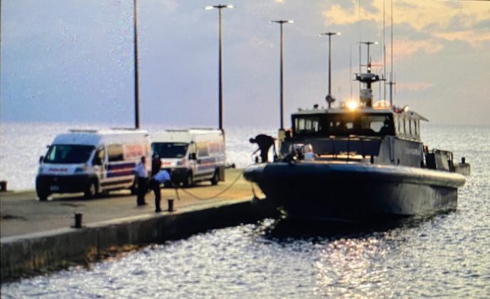 An infant and her parents were brought to shore Thursday evening by law enforcement officials. Photo: Taneos Ramsay