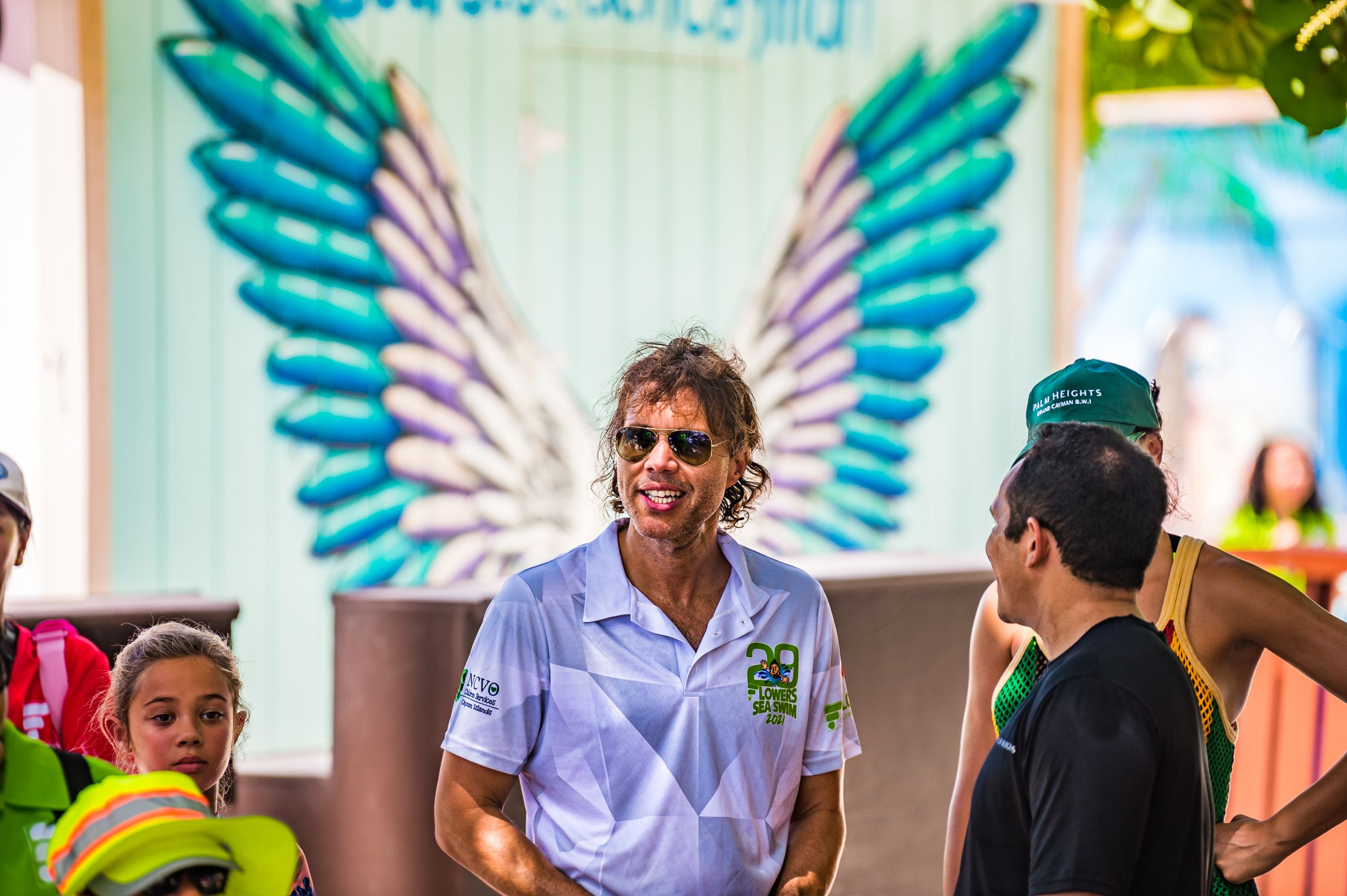 Hundreds turn out for the 29th annual Flowers Sea Swim Cayman Compass