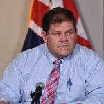 Quarantine reduced to five days for vaccinated travellers, but no plan for reopening