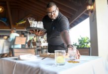 Cayman’s unemployment rate plummets as population passes 80k
