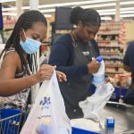 Businesses reinstate mask mandates as COVID re-emerges in community