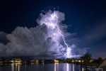 Spectacular lightning storm over Cayman A huge bolt of lightning splits the night sky